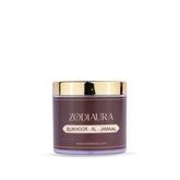 A glass jar of Bakhoor Al Jamaal incense with a gold-colored lid, labeled with the brand Zodiaura and the product name Bukhoor Al Jamaal.