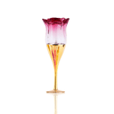 A rose-shaped perfume bottle with a colorful gradient and a gold-colored stem and base.