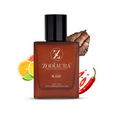 A square-shaped bottle of Zodiaura Raw perfume EDP spray for men with a wooden cap, surrounded by images of citrus fruits and a chili pepper, indicating the fragrance accords.